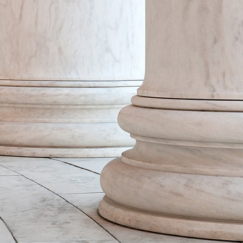 Detailed view of a series of white marble columns